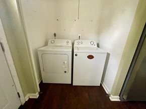 New Albany apartment for rent - A white sink and toilet in a small bathroom.
