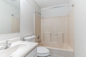 Louisville house for rent - a bathroom with a sink toilet and a shower