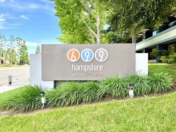 Westlake Village apartment for rent - A sign for Hampshire Westlake Village is displayed in front of a building.