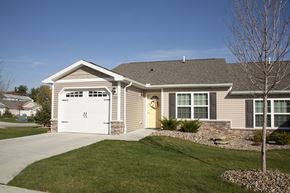 Cuyahoga Falls apartment for rent - a house with a driveway and a white garage door