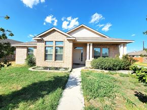 Killeen house for rent - a brick house with a sidewalk in front of it