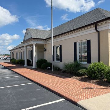 Greenville apartment for rent - the front of a building with a porch and columns