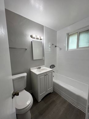 Calimesa apartment for rent - a small bathroom with a toilet and a tub and a sink