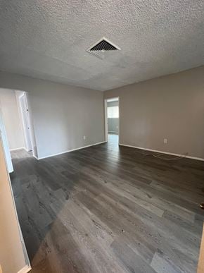 Calimesa apartment for rent - an empty living room with wood flooring and grey walls