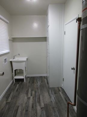 Patterson house for rent - A small white sink in a small room.