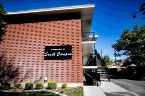 Provo apartment for rent - a building with a sign on the side of it