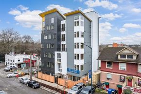 Seattle apartment for rent - the apartment building is being constructed on the corner of a city street