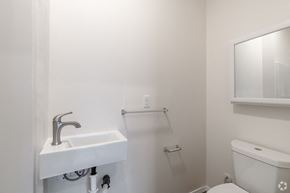 Seattle apartment for rent - a white bathroom with a sink and a toilet