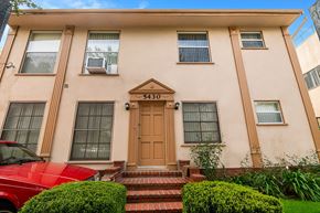Los Angeles apartment for rent - a house with a red car parked in front of it