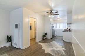 Los Angeles apartment for rent - an open kitchen and living room with a ceiling fan