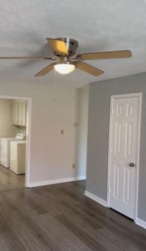 Lexington apartment for rent - an empty living room with a ceiling fan