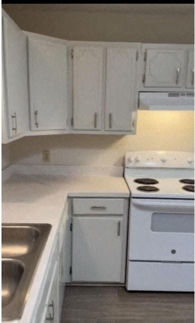 Lexington apartment for rent - a white kitchen with white appliances and white cabinets