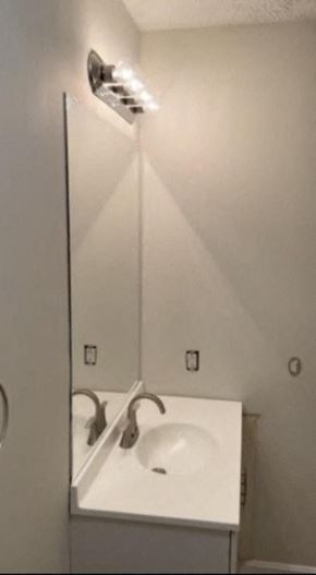 Lexington apartment for rent - a bathroom with a sink and a mirror