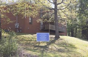 Lexington apartment for rent - an image of a building with a sign in front of it
