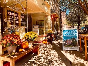 Pittsburgh apartment for rent - A flower shop with a sign that says Regent Square Rentals Property Management.