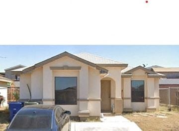 Laredo house for rent - a house with a car parked in front of it