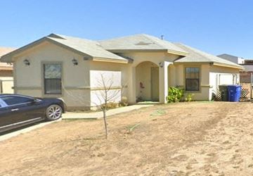 Laredo house for rent - a house with a car parked in front of it