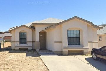 Laredo house for rent - a house with a car parked outside of it