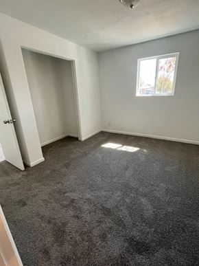Avondale apartment for rent - an empty room with a carpeted floor and a window