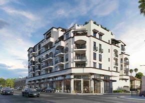 Los Angeles apartment for rent - A large white building with balconies and multiple stories.