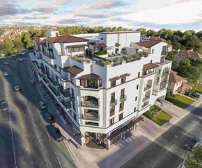 Los Angeles apartment for rent - A modern multi-story building with balconies and a mix of white and darker exterior walls.