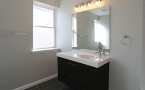 Philadelphia apartment for rent - a bathroom with a white sink and a mirror