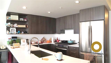 Richmond house for rent - a kitchen with a sink and a refrigerator
