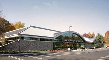 Montvale apartment for rent - the exterior of a building with a parking lot