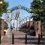 Philadelphia apartment for rent - a view of an archway with trees and a sidewalk