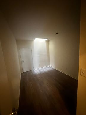 Philadelphia apartment for rent - an empty room with a wooden floor and a door