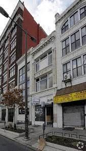 Philadelphia apartment for rent - a street corner with tall buildings and a street light