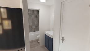 Kalispell apartment for rent - a small bathroom with a toilet and a sink and a mirror