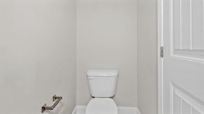 Parkton house for rent - a bathroom with a white toilet and a door