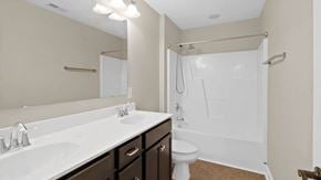 Parkton house for rent - a bathroom with a sink and a shower and a toilet