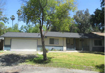 Danville house for rent - a white house with a tree in front of it