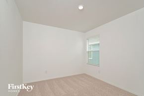 Princeton house for rent - a bedroom with white walls and carpet and a window