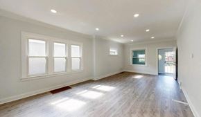 Hammond house for rent - an empty living room with white walls and wood floors