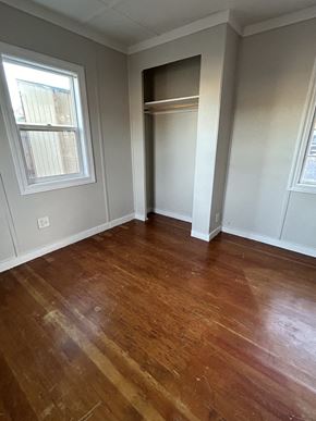 Soap Lake house for rent - an empty room with wooden floors and a closet