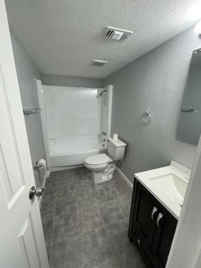 Hughes Springs house for rent - A bathroom with a toilet, sink, and bathtub.