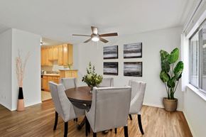 Brentwood apartment for rent - A dining room with a table and chairs.
