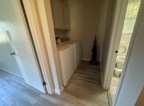 Fayetteville house for rent - a laundry room with a washer and dryer in it