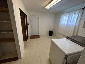Prince Albert house for rent - a laundry room with a washer and dryer in it