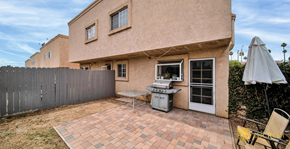 San Fernando apartment for rent - the backyard of a house with a patio and a grill