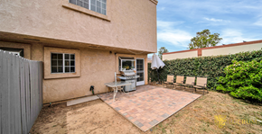 San Fernando apartment for rent - a patio with a table and chairs in front of a house