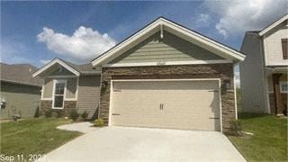Utica house for rent - a garage door in front of a house