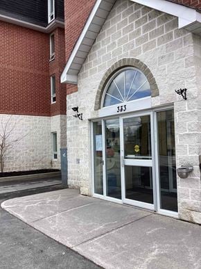 Peterborough apartment for rent - the entrance of a building with a glass door