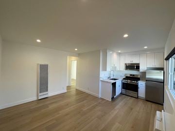 Los Angeles apartment for rent - a renovated kitchen with white cabinets and stainless steel appliances