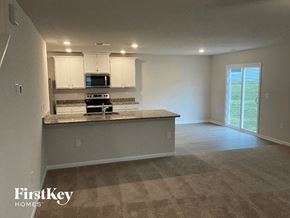 Charlotte house for rent - an empty kitchen and living room in a house