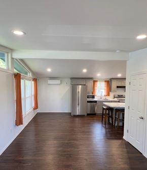 Castle Rock apartment for rent - A kitchen with a refrigerator, oven, and sink.