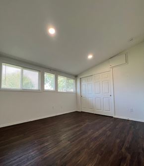 Castle Rock apartment for rent - A room with a white door and windows.